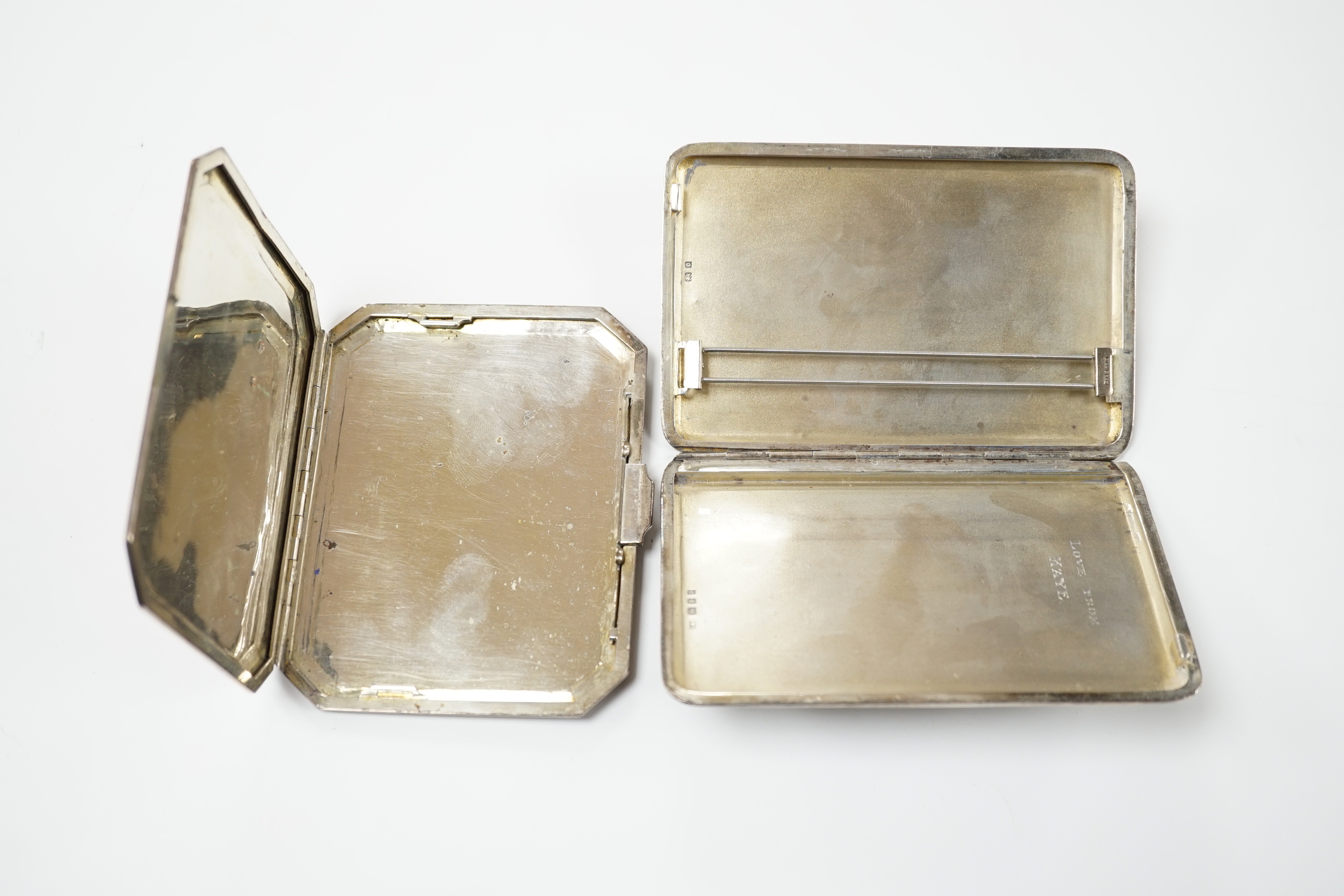 A George V engine turned silver cigarette case, 183 grams, and a Thai white metal and niello cigarette case